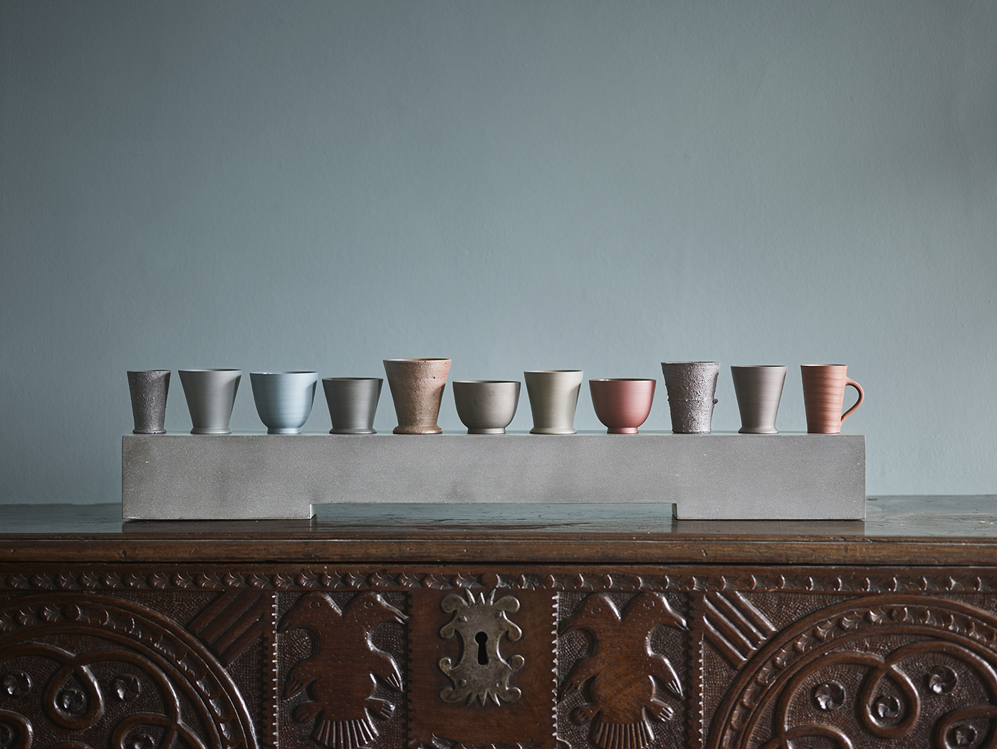 Eleven Cups on a Ground