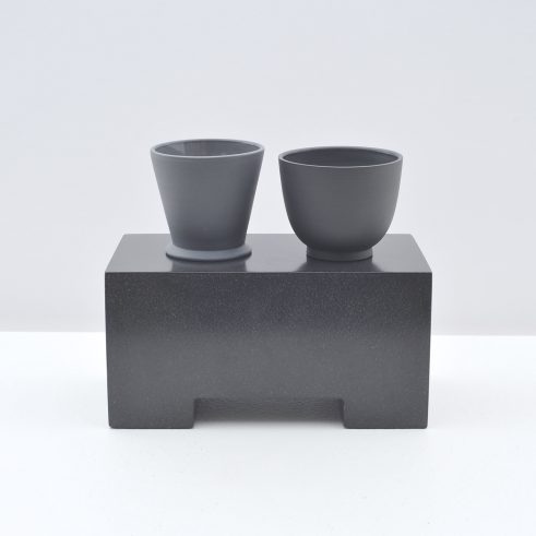 Two Cups On A Ground