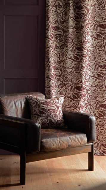 Wren fabric, burgundy on oatmeal linen union, designed by Mark Hearld