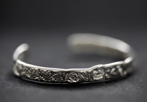 Flora and Fauna Struck Silver Bangle