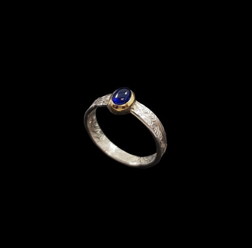 Silver and Oval Blue Sapphire Ring