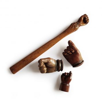 Group of Three Carved Hand Snuff Boxes and a Back Scratcher