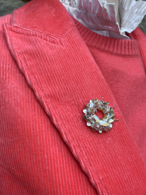 Circular Oval Flower Mini Brooch (modelled)