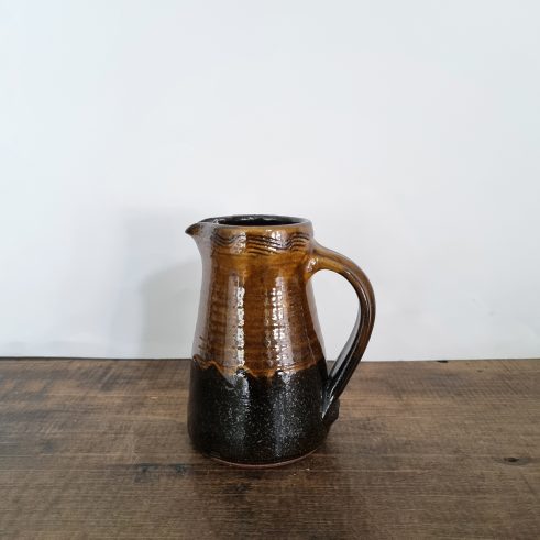 small glazed earthenware jug with slip decoration by Clive Bowen