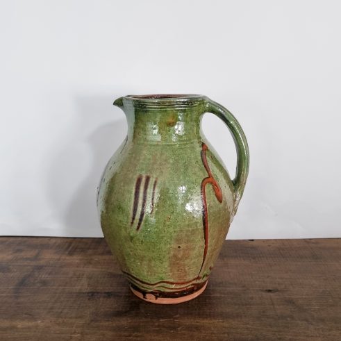 glazed earthenware jug with slip decoration by Clive Bowen