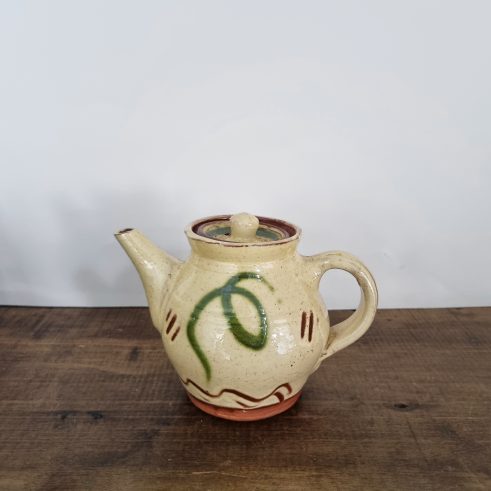 glazed earthenware teapot with slip decoration by Clive Bowen
