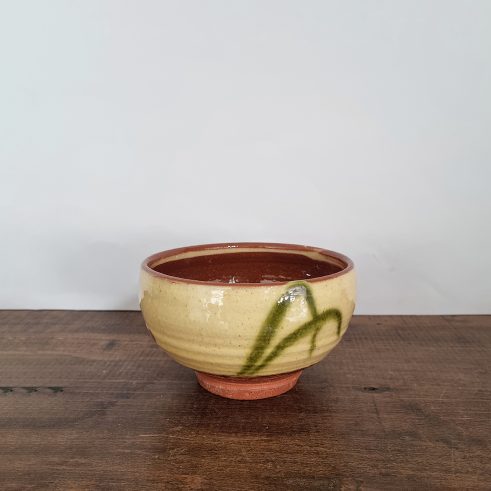 small glazed earthenware bowl with slip decoration by Clive Bowen