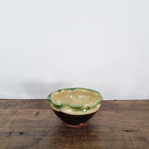 small glazed earthenware bowl with slip decoration by Clive Bowen