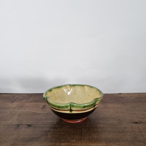 small glazed earthenware bowl with slip decoration by Clive Bowen
