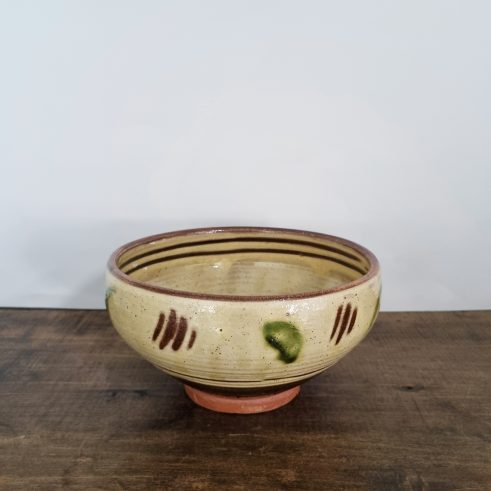 glazed earthenware bowl with slip decoration by Clive Bowen