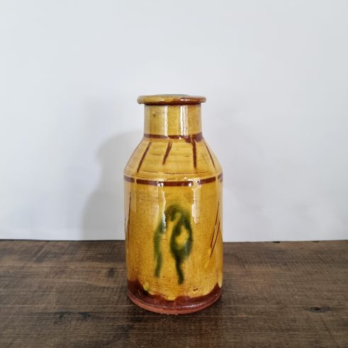 glazed earthenware lidded jar with slip decoration by Clive Bowen