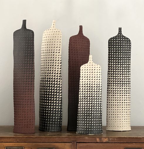 A selection of red, white and black stoneware