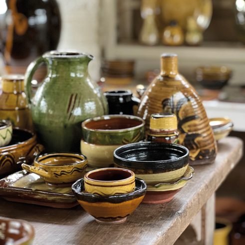 selection of glazed earthenware with slip decoration