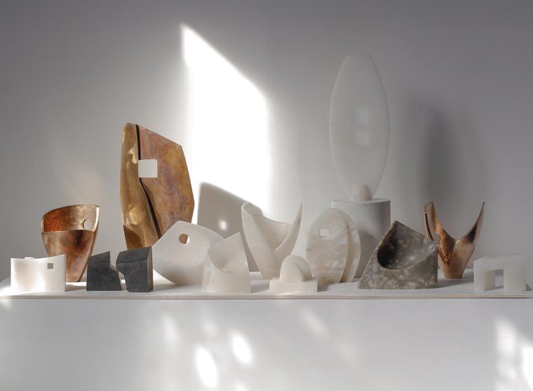 Sculptures in alabaster, black granite and bronze