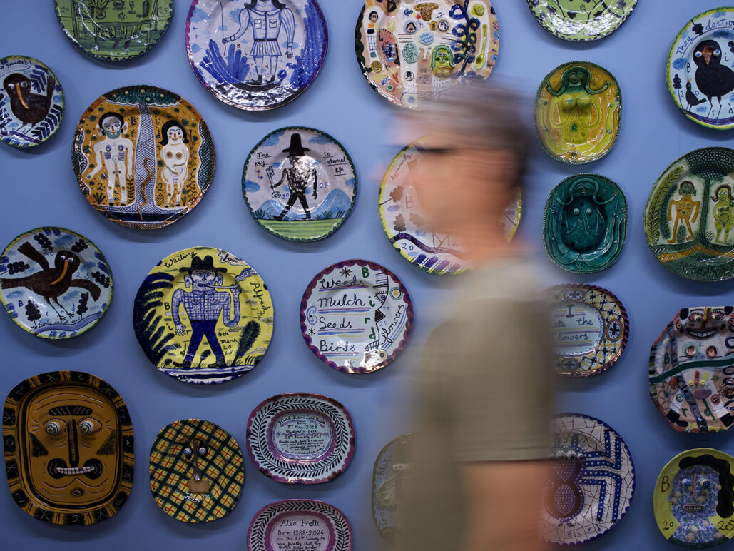 Stephen Bird with wall of plates