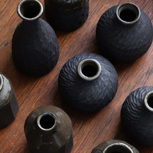 A selection of black stoneware vessels
